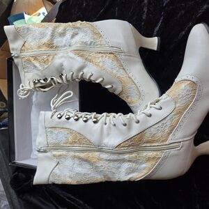 Cream and White Heeled Boots with Lace-Up Closure